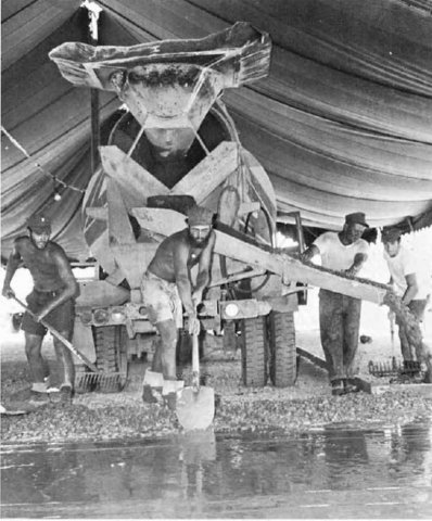 pouringconcreteforthemesshall.jpg